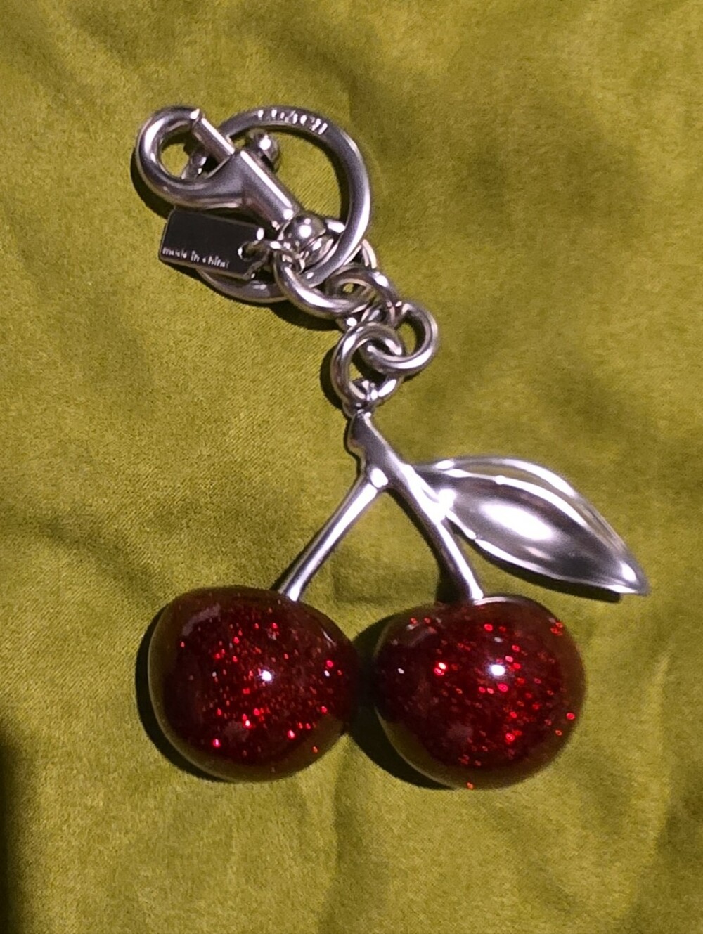 Coach Silver Cherry Keychain with Red Glitter Charms